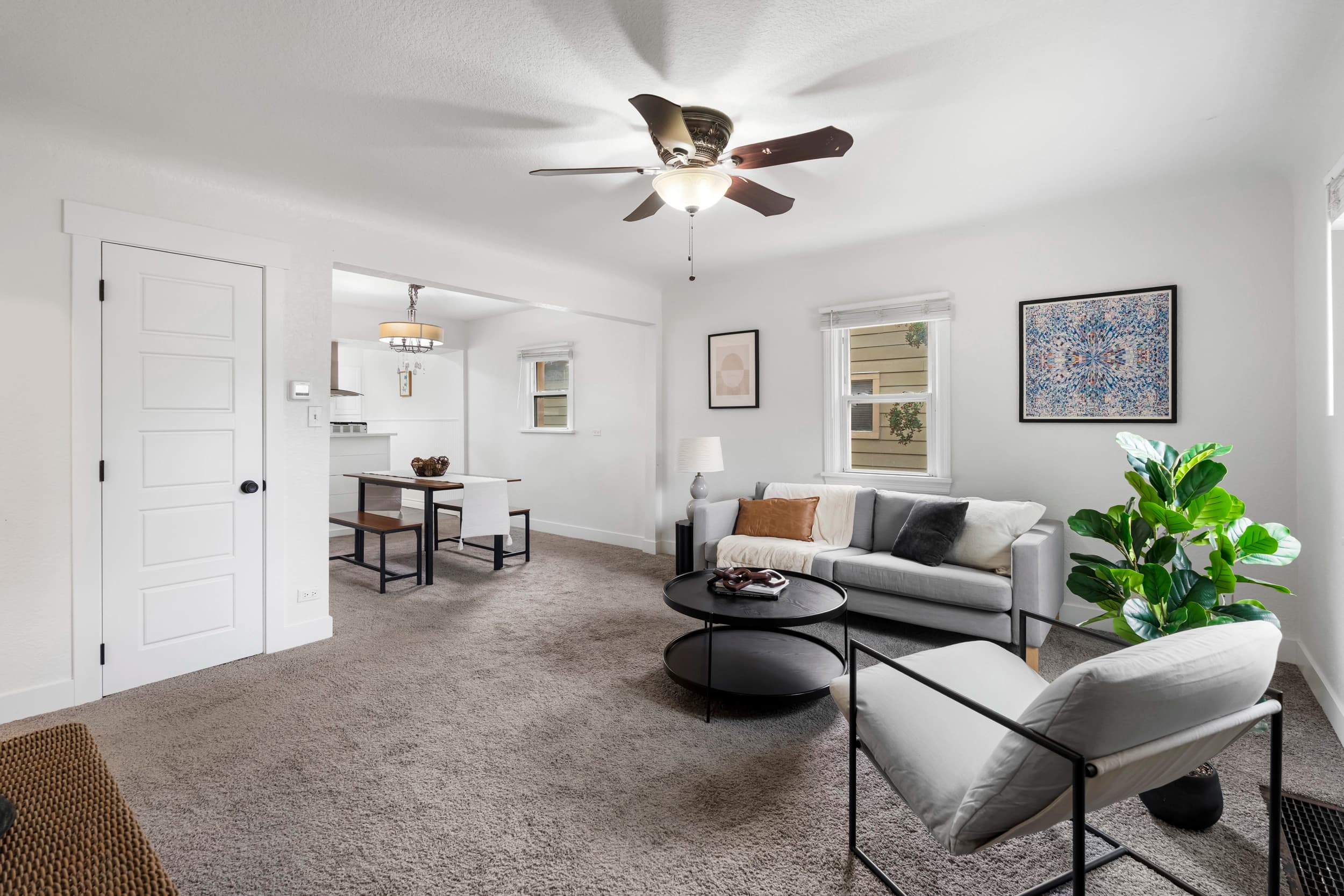 Interior living room opening onto the dining area